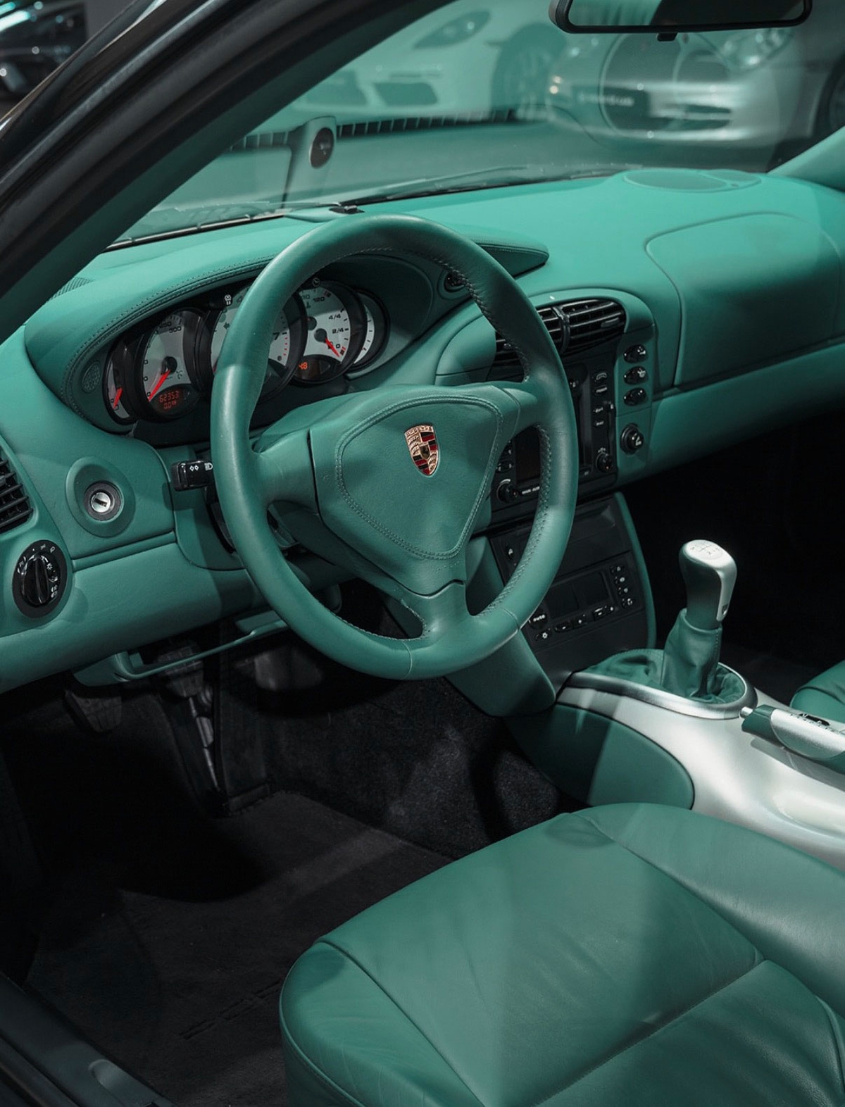 Green leather interior of a Porsche 911 sports car